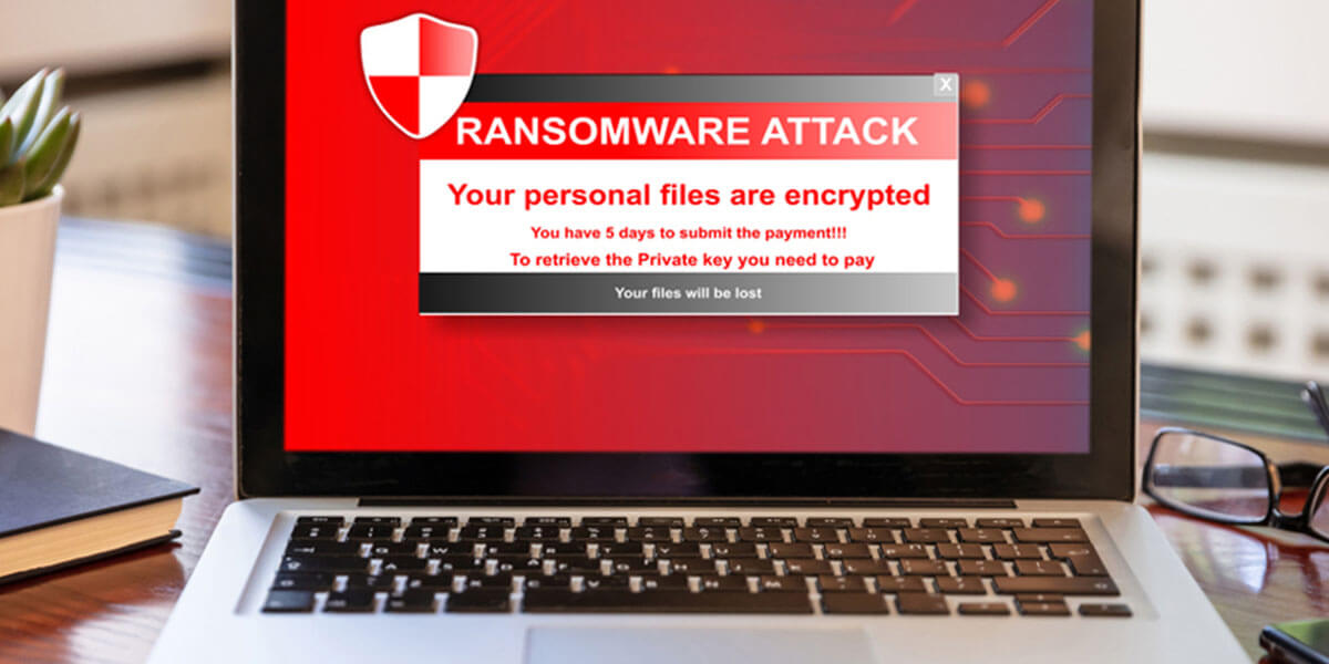 Ransomware Attack alert on laptop screen