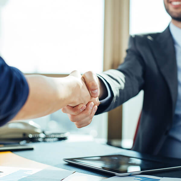 Man and woman shaking hands